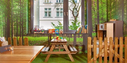 vegetarisch vegan essen gehen - Tageszeiten: Nachmittag - Köln - Blick auf die Kinderecke - Bunte Burger Bio-Restaurant und Catering Köln